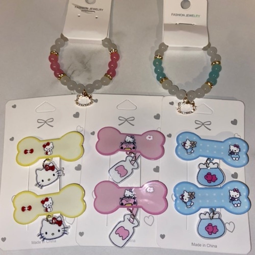 Take All Two Hello Kitty Bracelets And Six Hello Kitty hair Clips